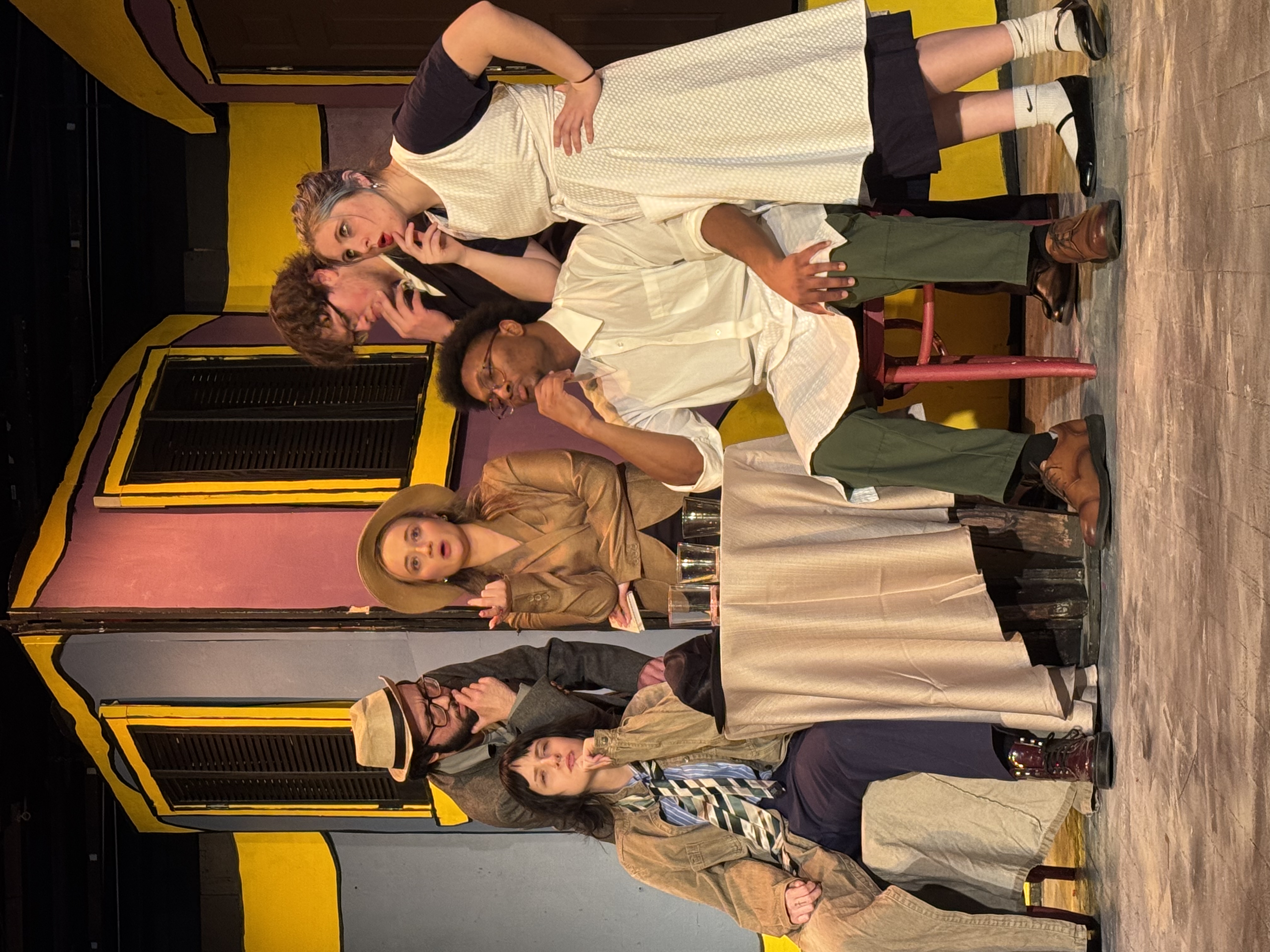 Cast of Rhinoceros deep in thought.