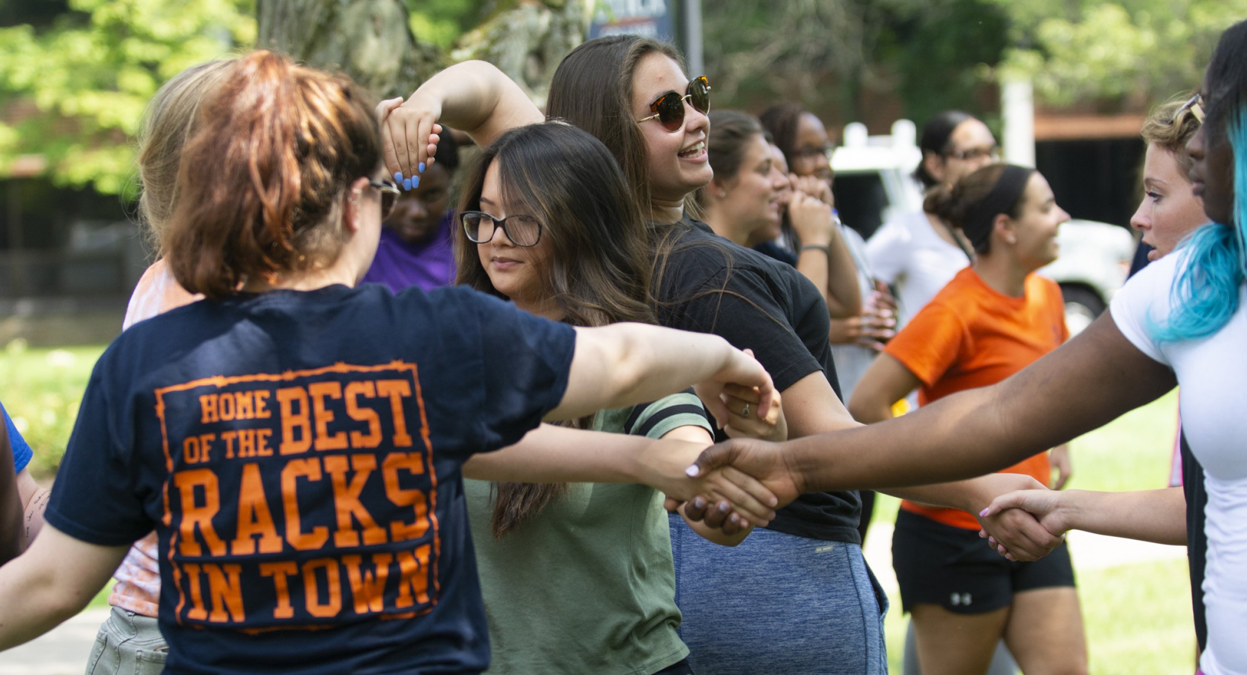 College Engagement - Students Holding Hands