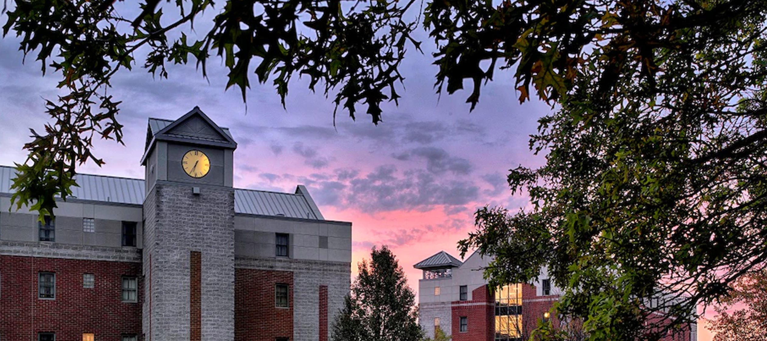 View at dusk of Bell Hall on the Utica College campus.