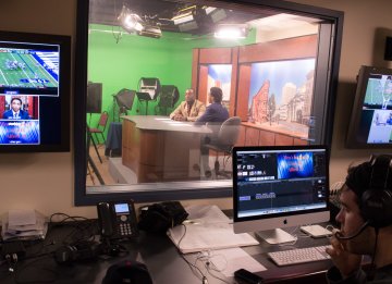 Communication and Media students inside the campus TV studio.