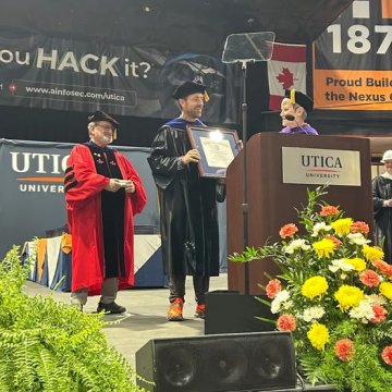 Dr Michael McCarthy receives 2025 Virgil Crisafulli Award